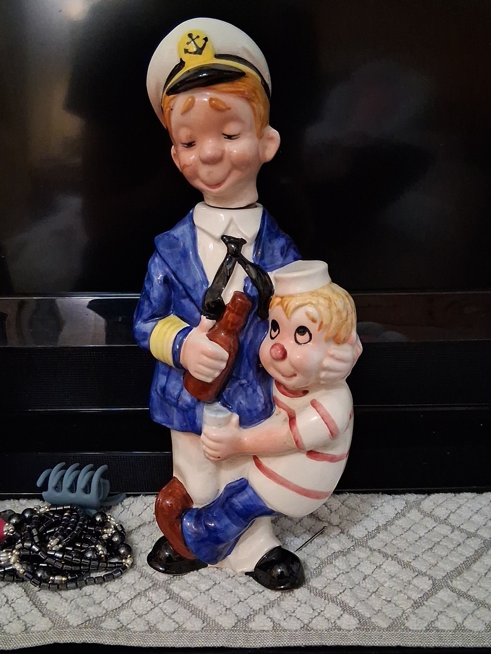 Retro 1950s Bond War Ceramic Musical Liquor Figurine.